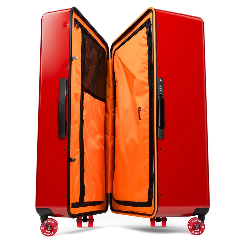 Open interior of the Floyd Bold suitcase in Bahia Red