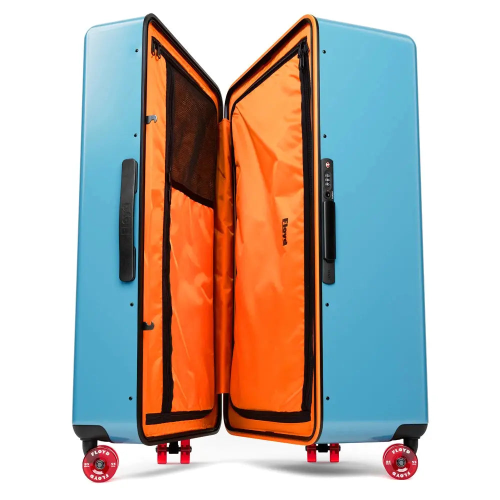Open interior of the Floyd Bold suitcase in Miami Blue