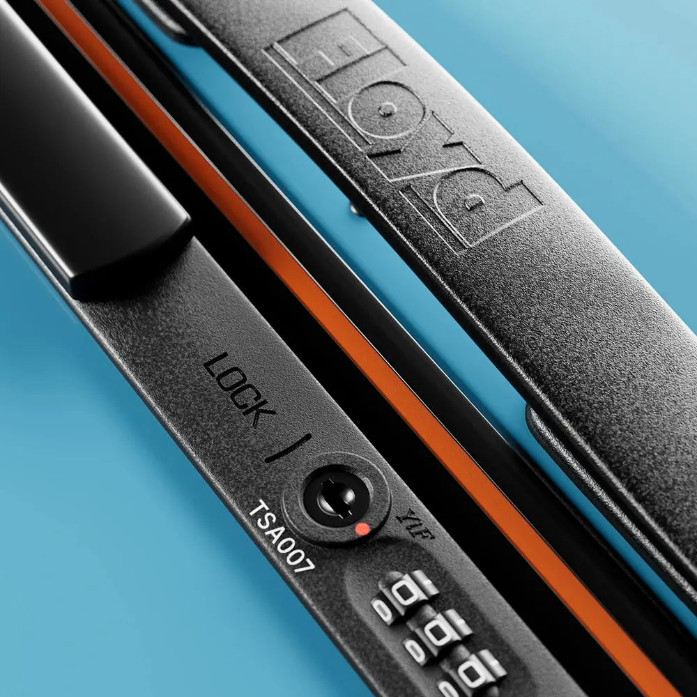 TSA combination lock detail on the Floyd Bold suitcase in Miami Blue