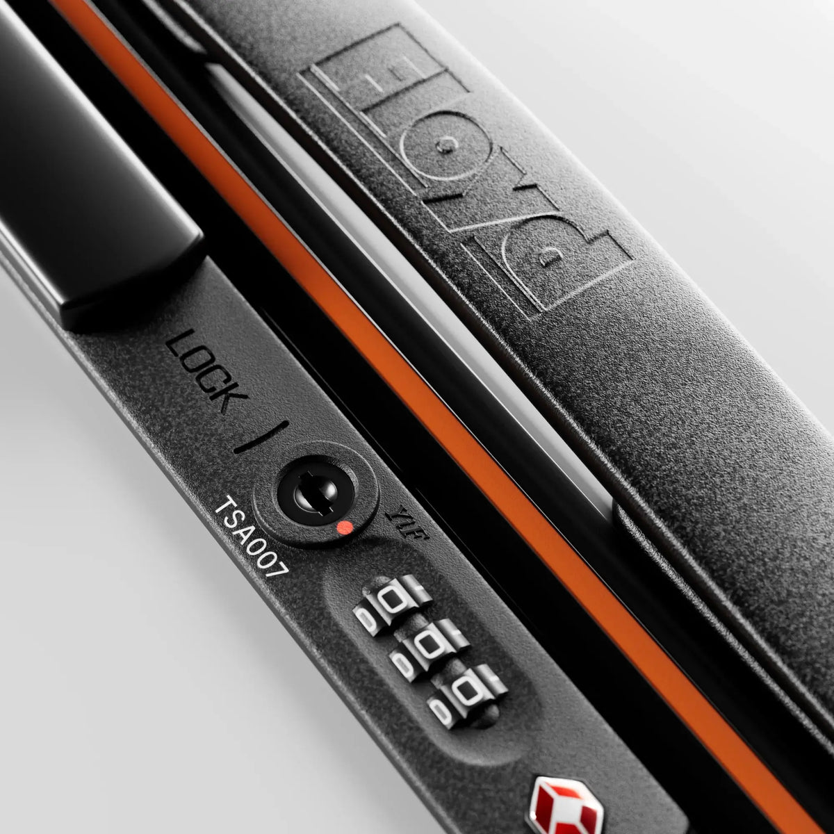 TSA combination lock detail on the Floyd Check-In suitcase in Bounty White