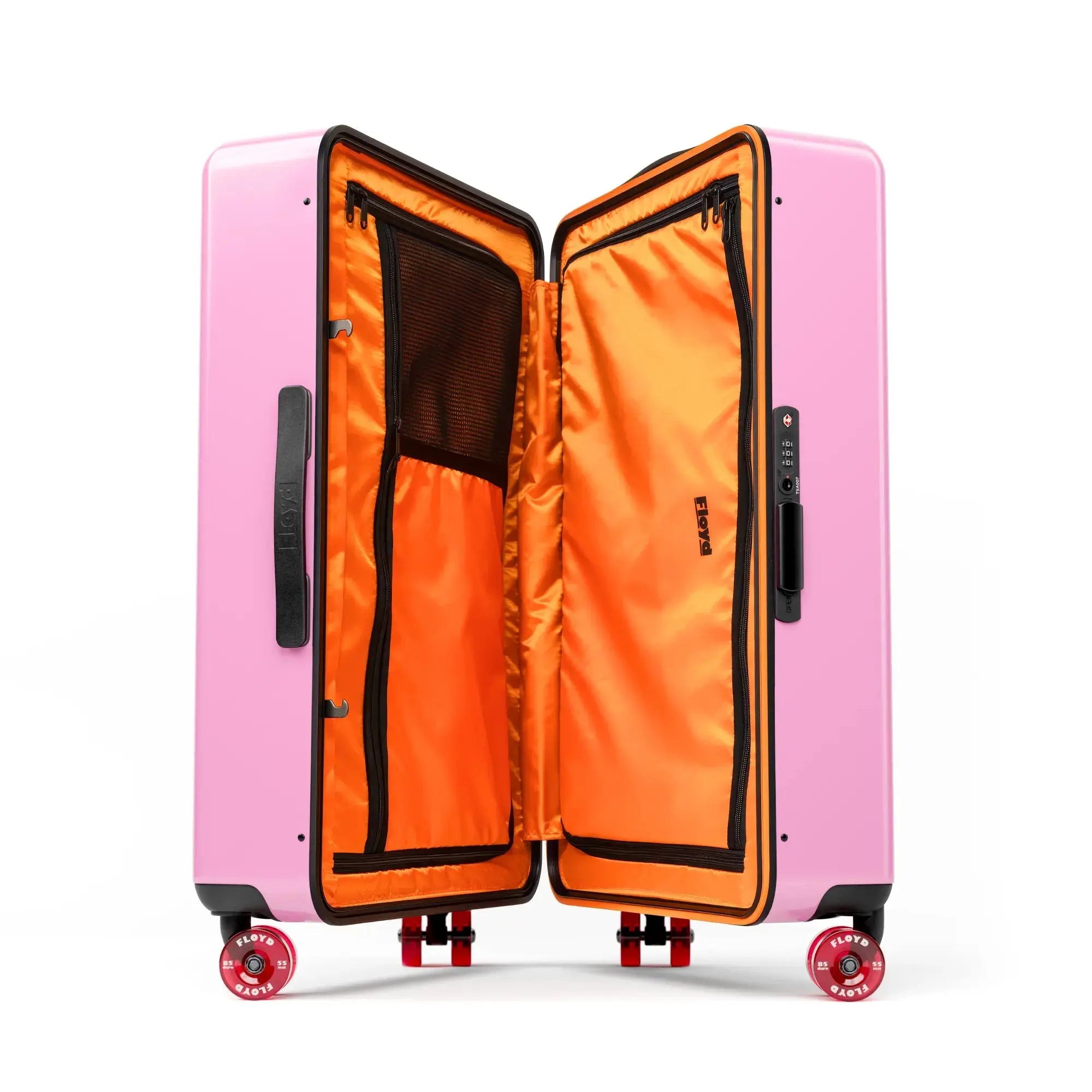 Open interior of the Floyd Check-In suitcase in Sugar Pink
