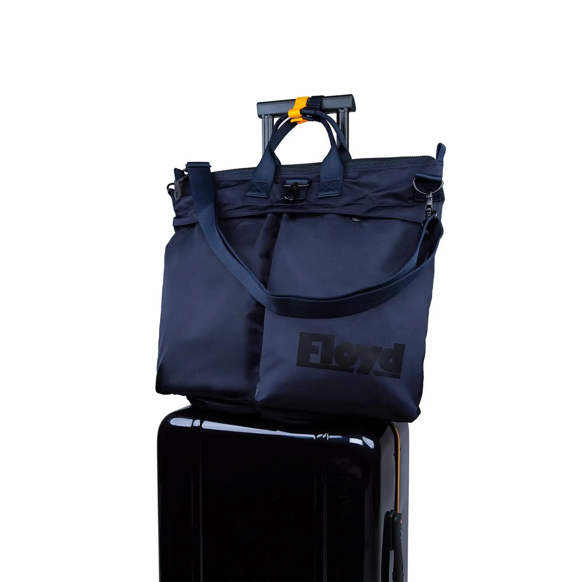 Floyd Helmet Bag in Galaxy Night attached to a Floyd suitcase