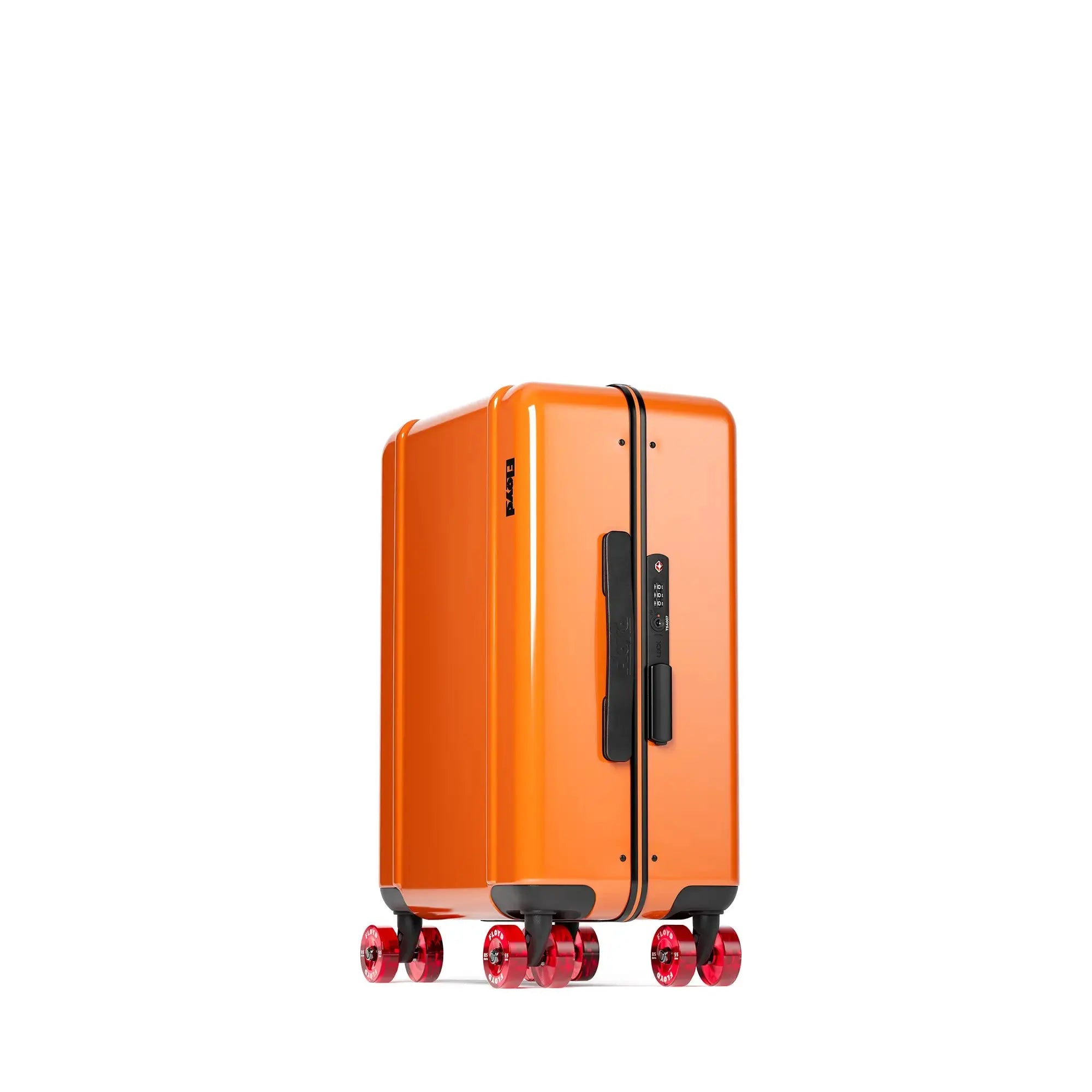Three-quarter view of the Floyd Compact suitcase in Hot Orange