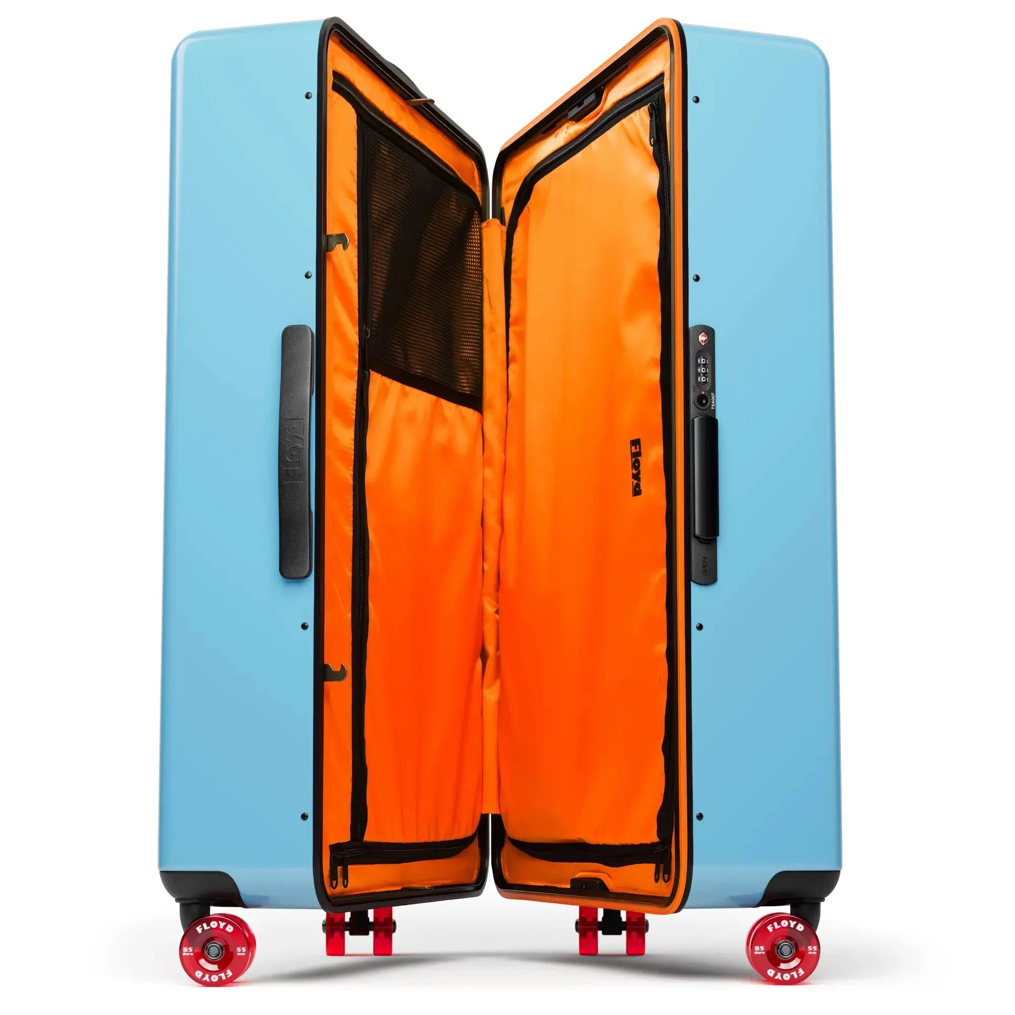 Open interior of the Floyd Trunk suitcase in Miami Blue