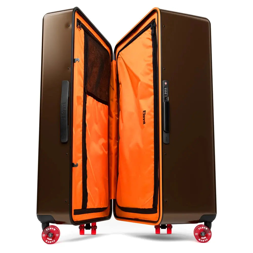 Open interior of the Floyd Bold suitcase in Bronco Brown