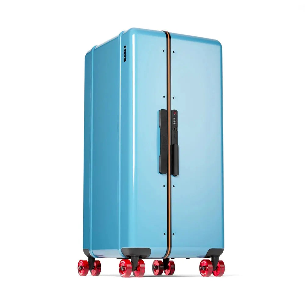 Three-quarter view of the Floyd Bold suitcase in Miami Blue