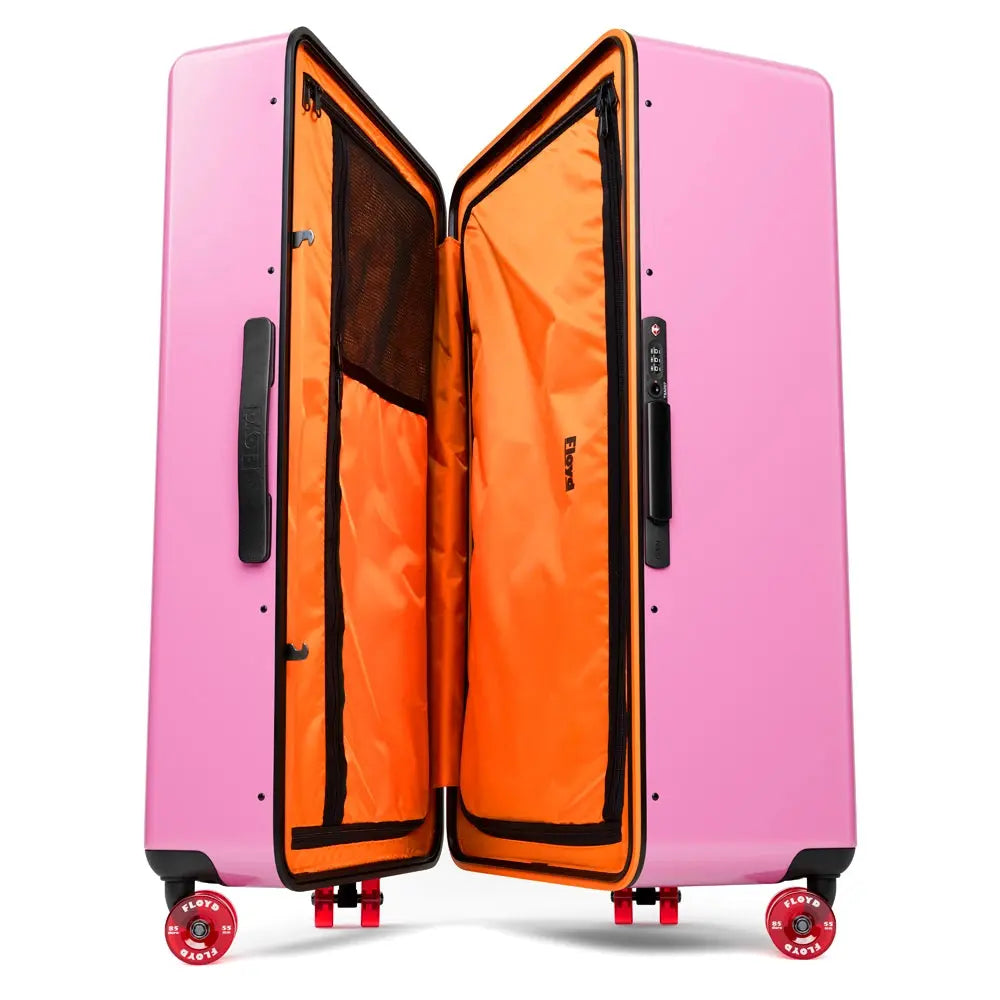 Open interior of the Floyd Bold suitcase in Sugar Pink