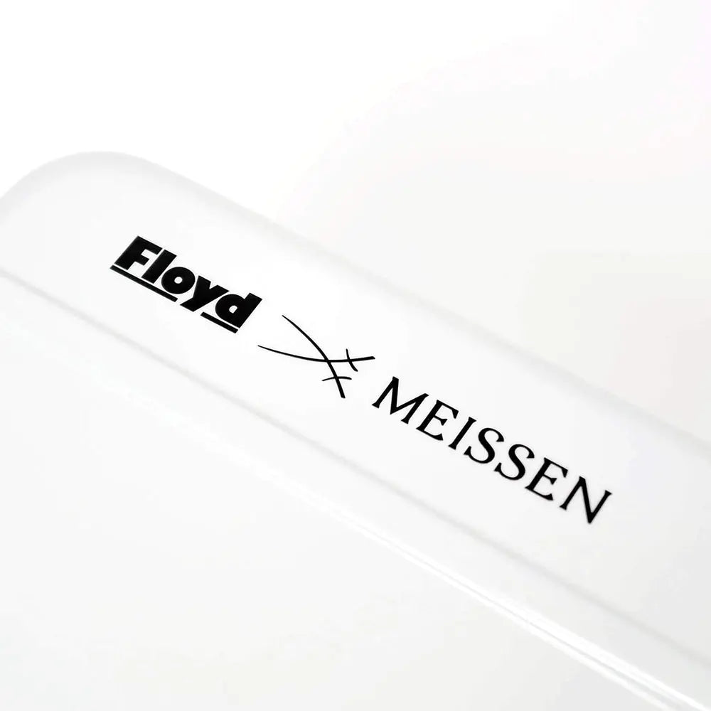Floyd x Meissen collaboration logo on the white Cabin suitcase