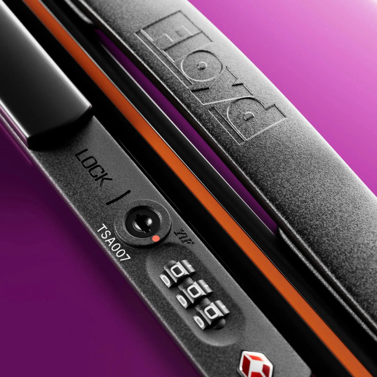 TSA combination lock detail on the Floyd Cabin suitcase in Magic Purple