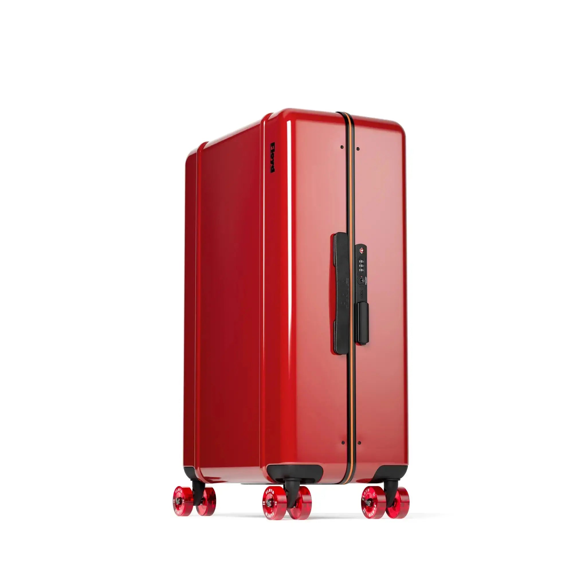 Three-quarter view of the Floyd Check-In suitcase in Bahia Red