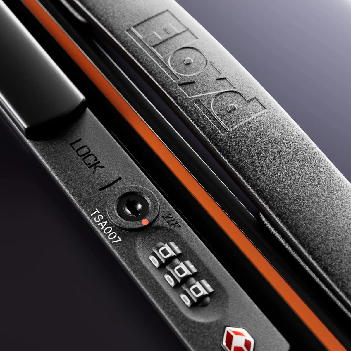 TSA combination lock detail on the Floyd Check-In suitcase in Galaxy Night