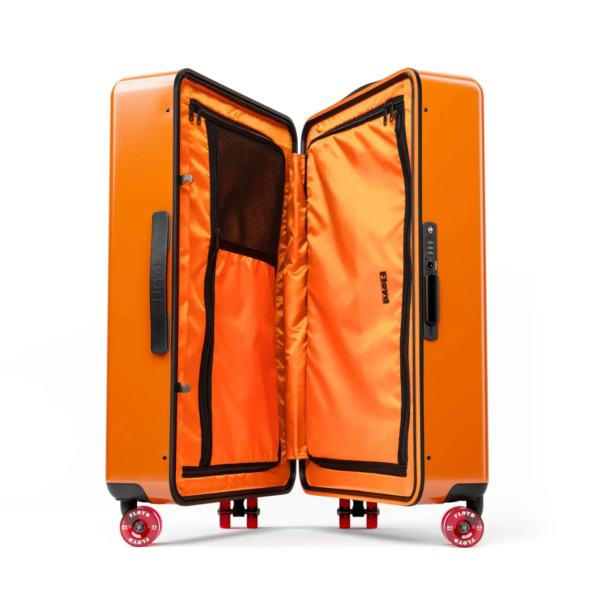 Open interior of the Floyd Check-In suitcase in Hot Orange