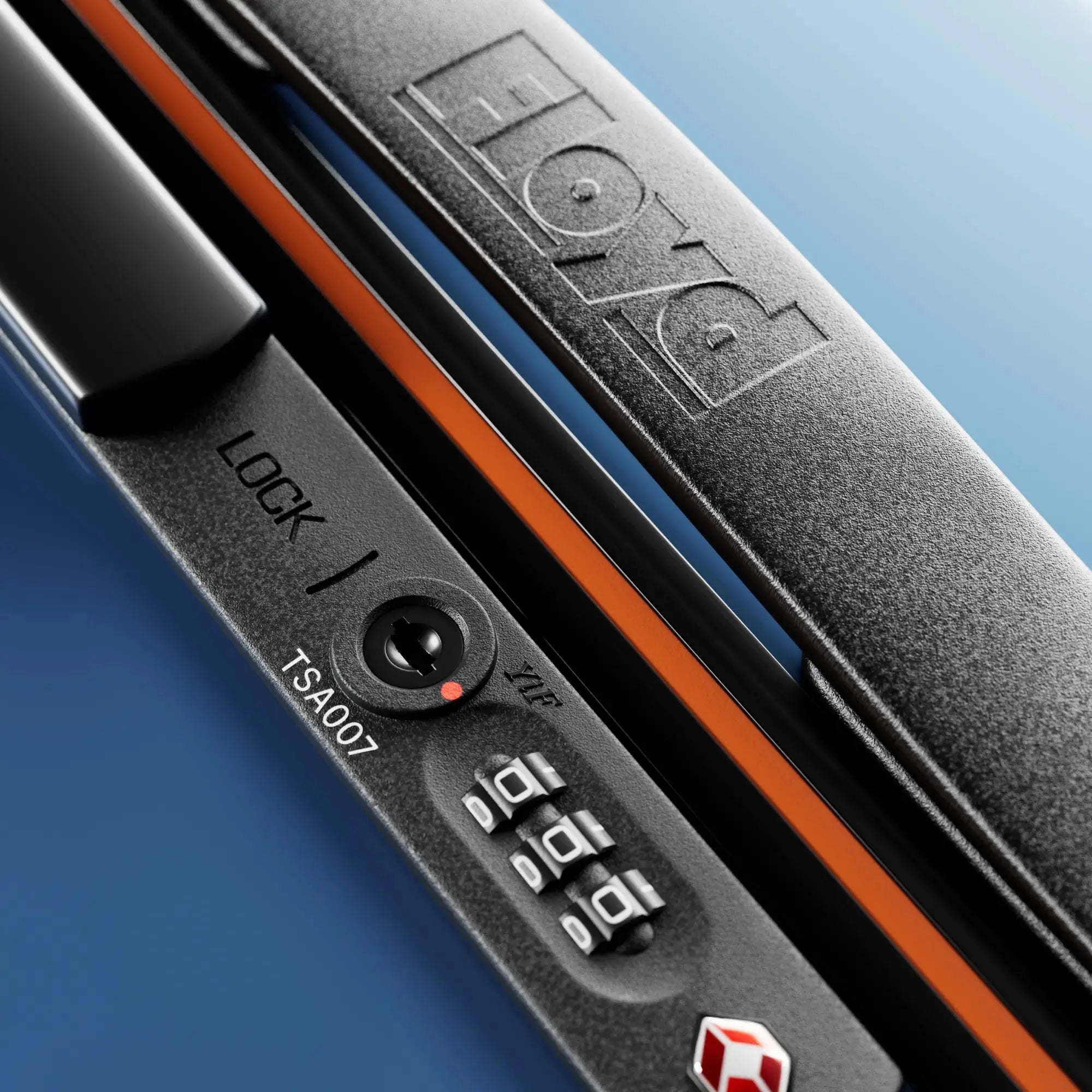 TSA combination lock detail on the Floyd Check-In suitcase in Pacific Blue