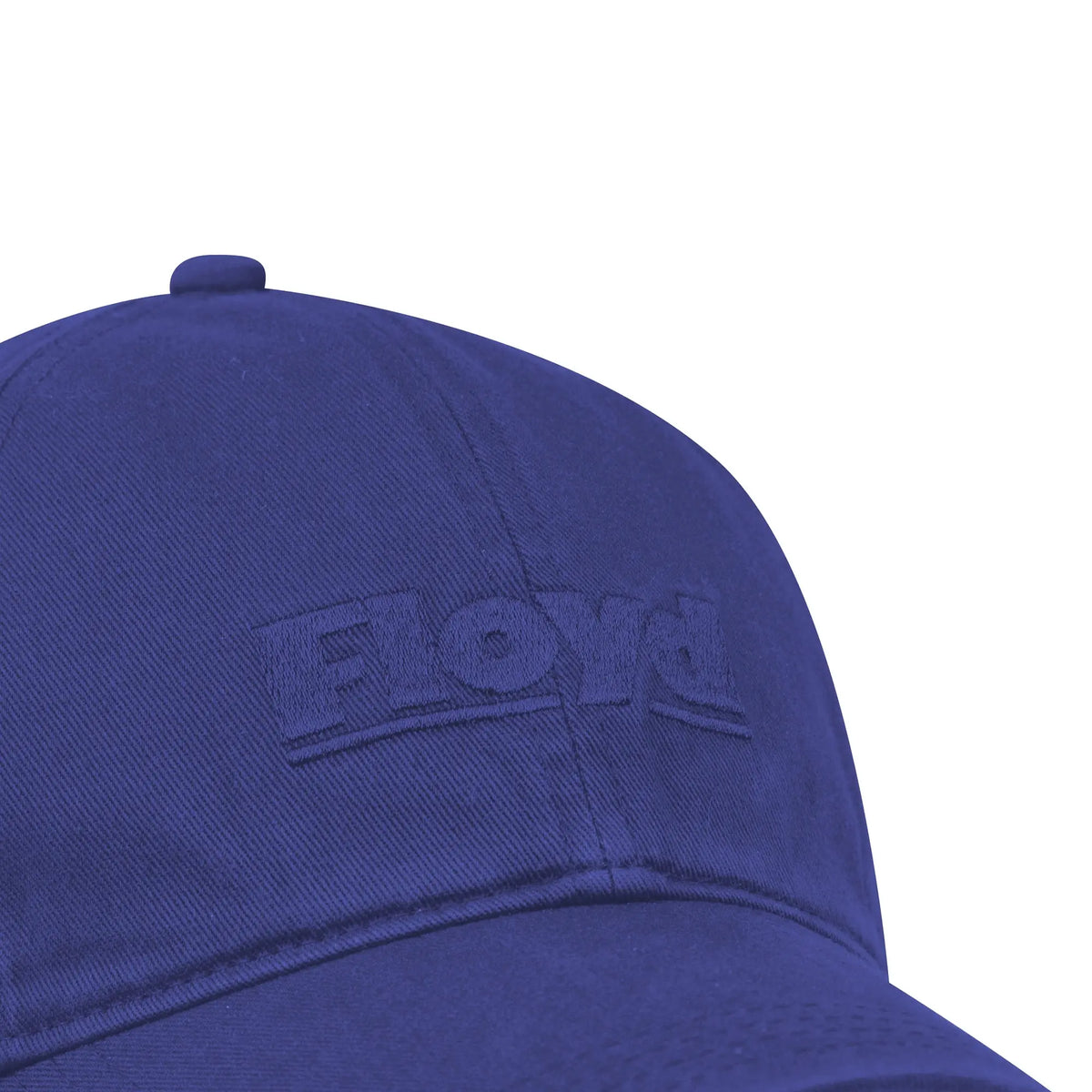 Close-up of the embroidered Floyd logo on the Cotton Cap in Funky Lilac.
