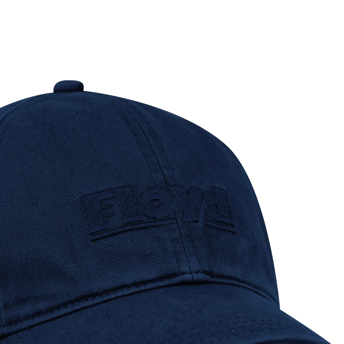 Close-up of the embroidered Floyd logo on the Cotton Cap in Shark Blue.