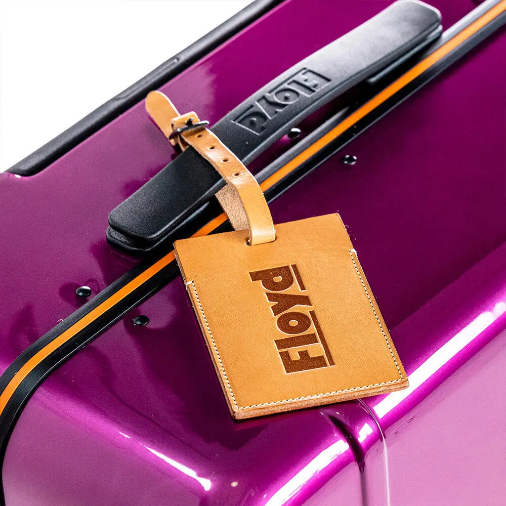 Luggage Tag attached to a Floyd suitcase – Floyd Luggage Tag