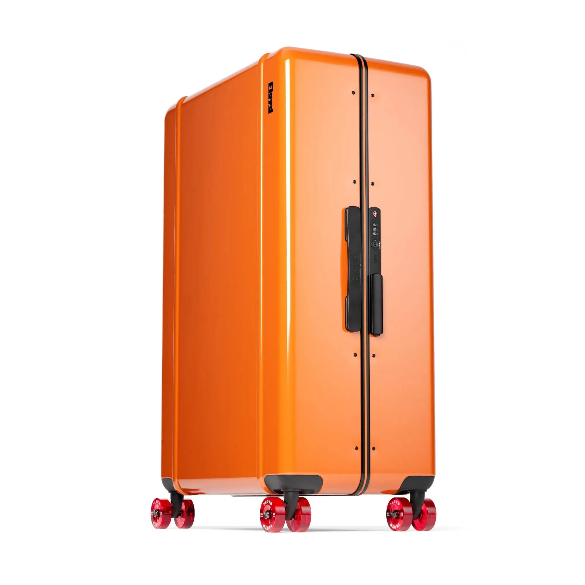 Three-quarter view of the Floyd Trunk suitcase in Hot Orange