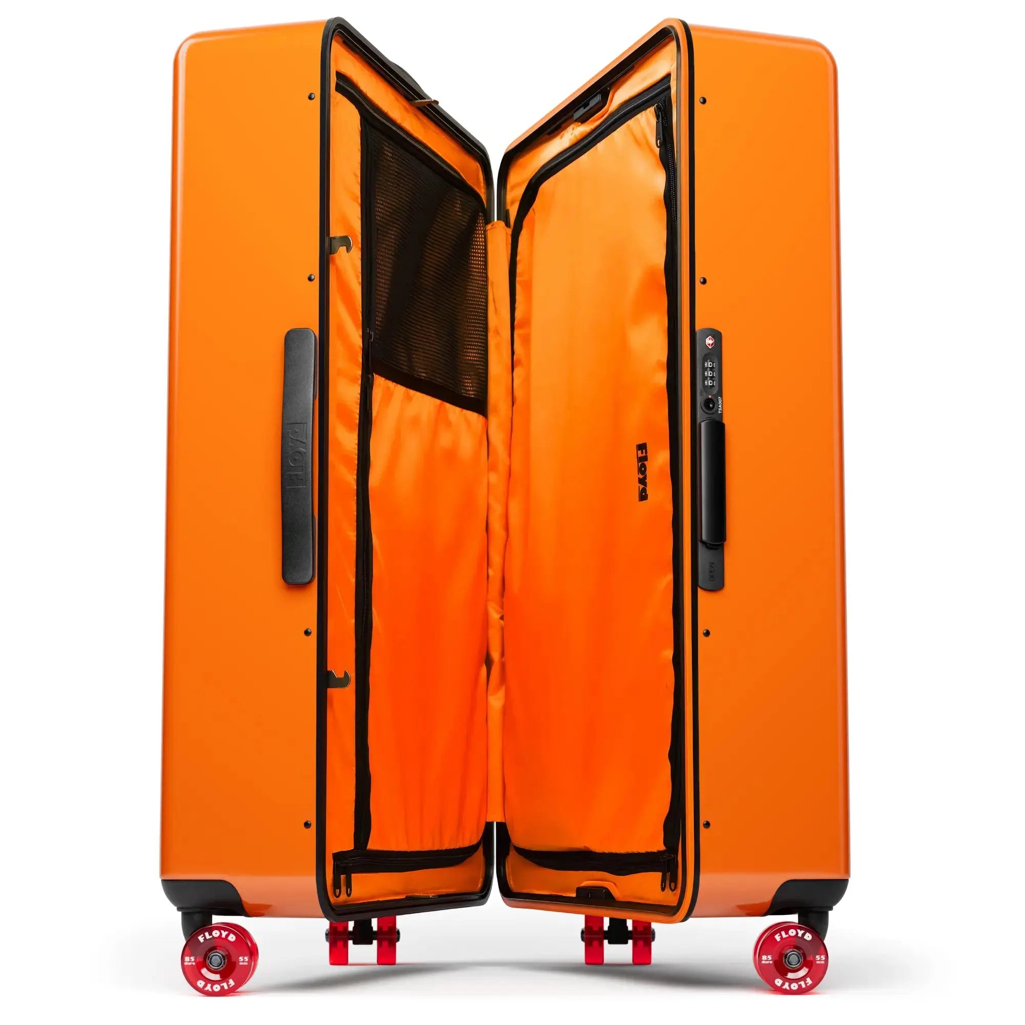 Open interior of the Floyd Trunk suitcase in Hot Orange