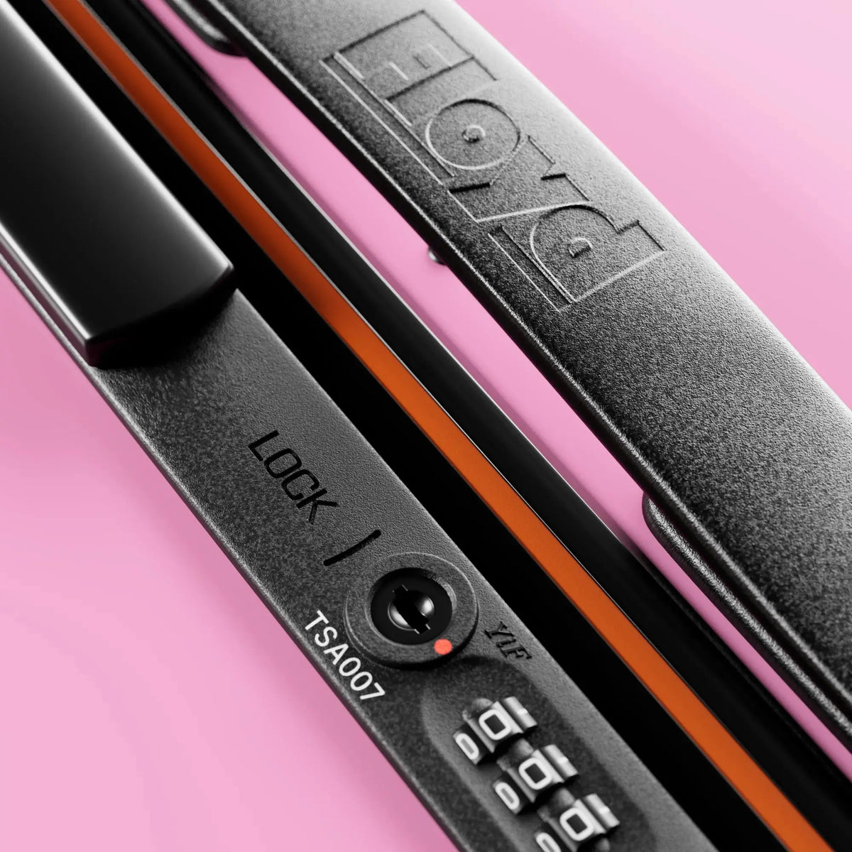 TSA combination lock detail on the Floyd Trunk suitcase in Sugar Pink