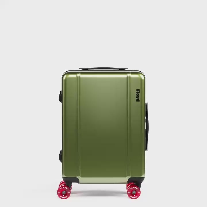 Floyd Junior suitcase rotating through available colors in a 360-degree view