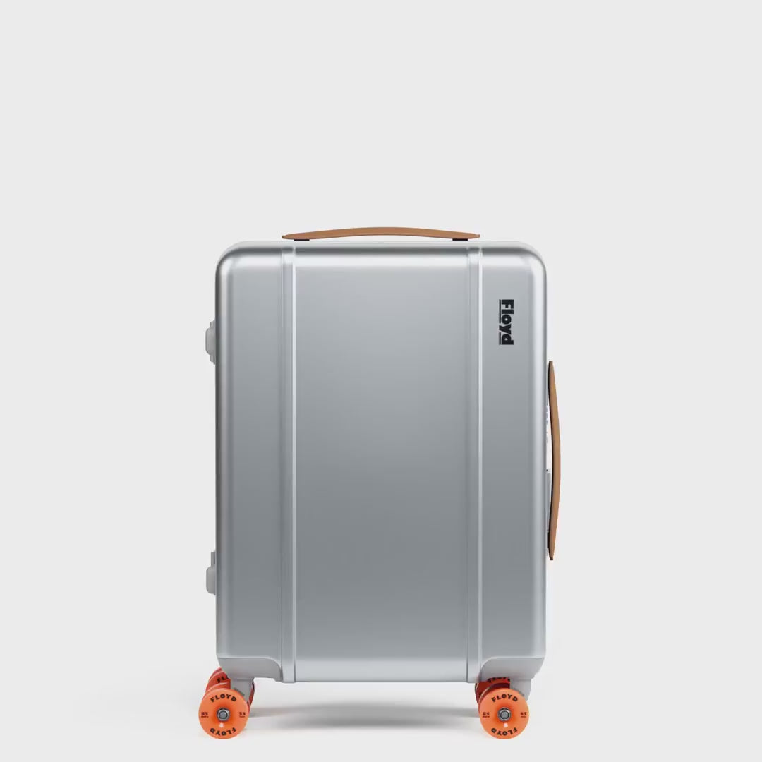 Floyd Cabin Aluminum suitcase rotating in a 360-degree view