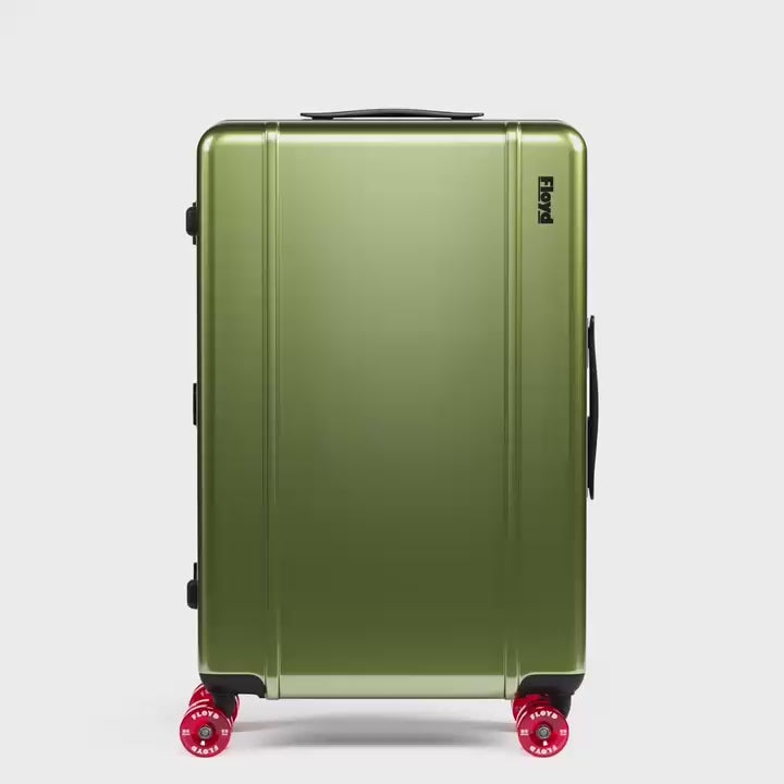 Floyd Check-In suitcase rotating through available colors in a 360-degree view