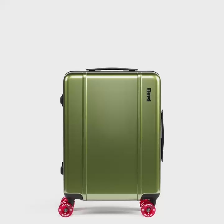 Floyd Cabin suitcase rotating through available colors in a 360-degree view